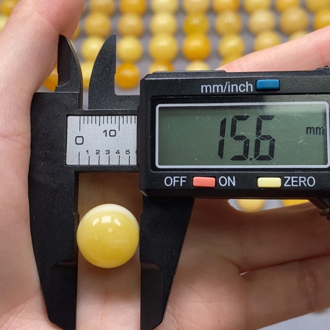 桔***.琥珀未镶嵌裸石纯天然