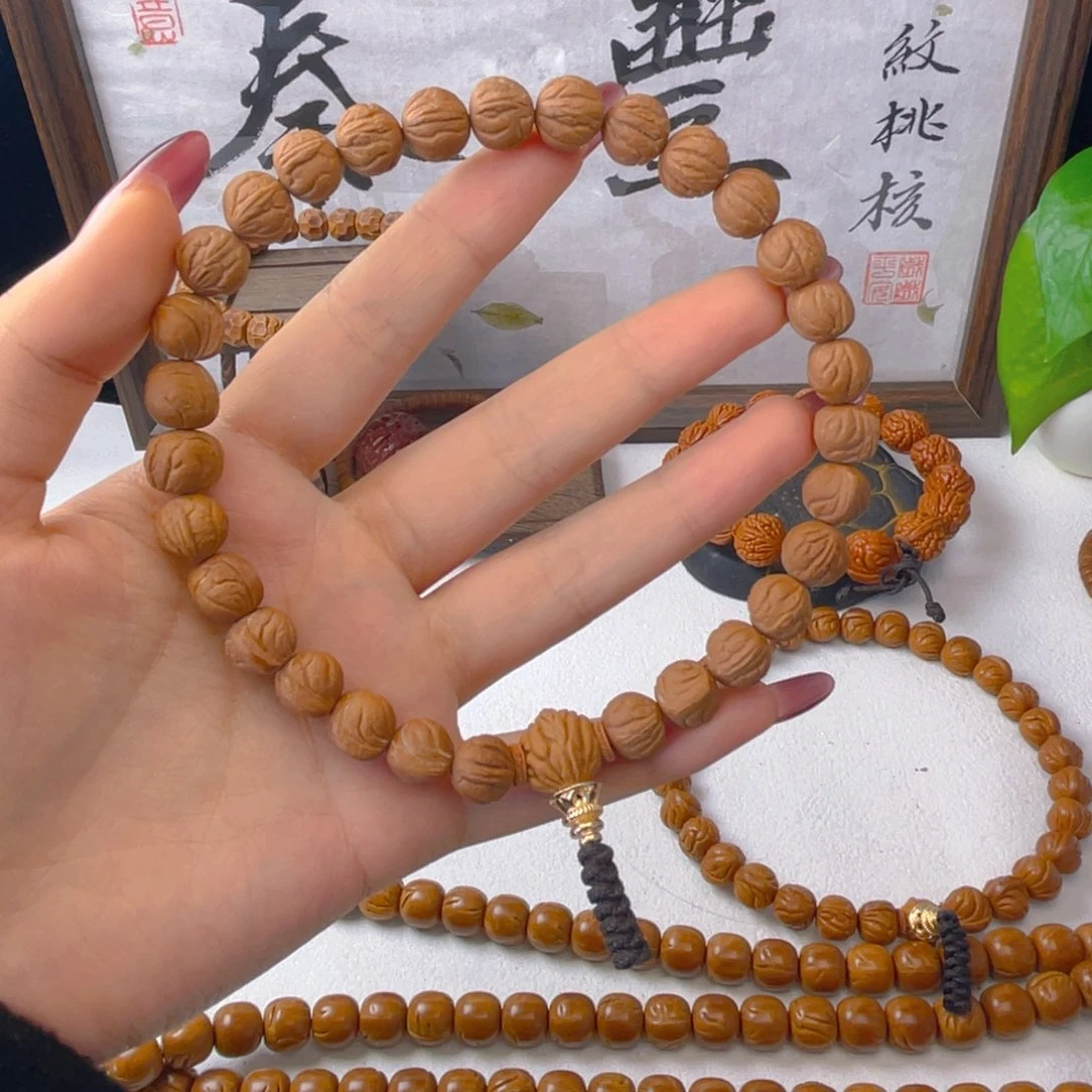 西***》秦岭龙纹桃核手持