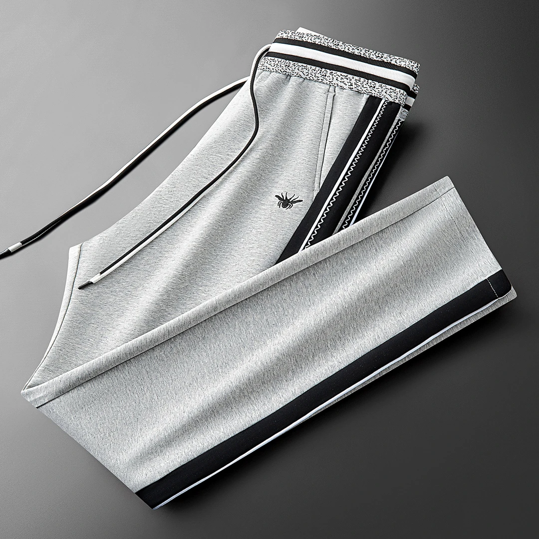 秋冬时尚撞色拼接男士直筒卫裤轻奢面膜空气层运动休闲裤潮流百搭