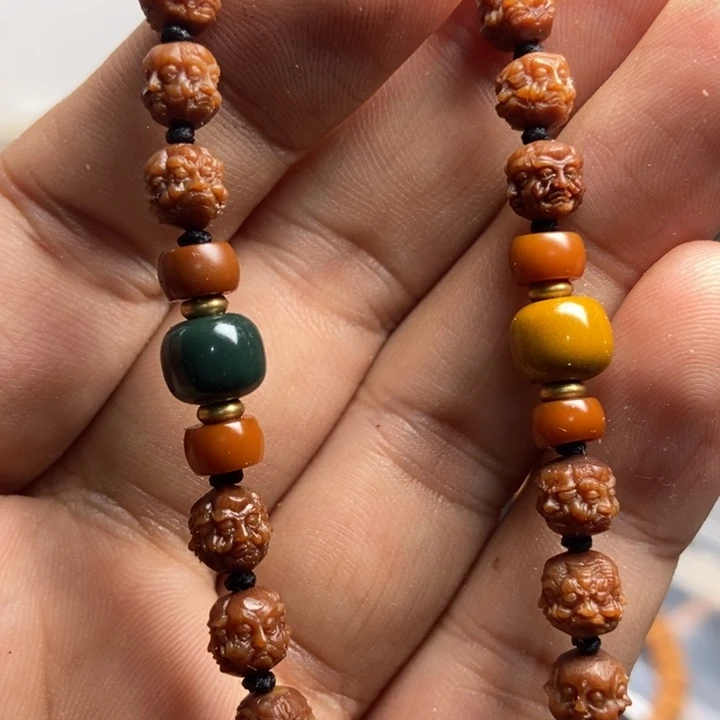 橄榄核吊坠在一起一整