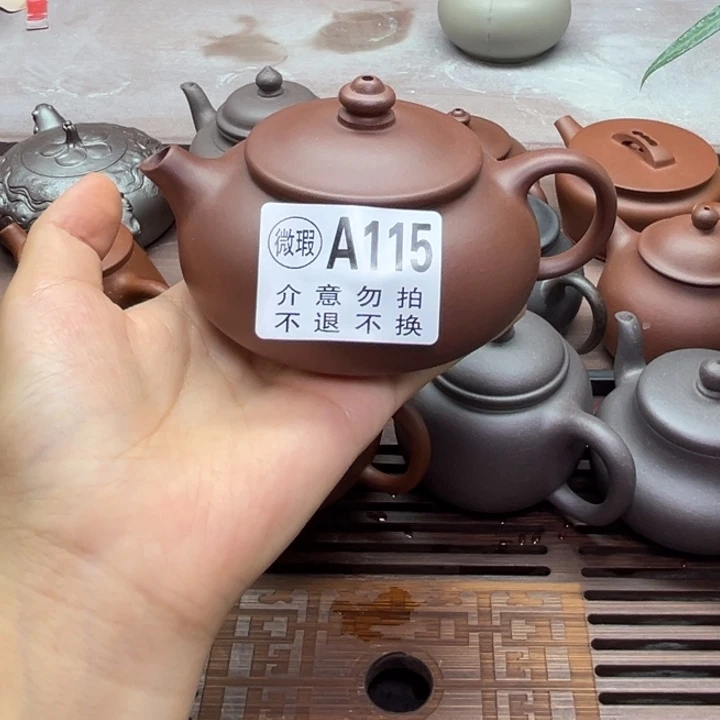 紫砂1微瑕寒江。  150cc不退不换