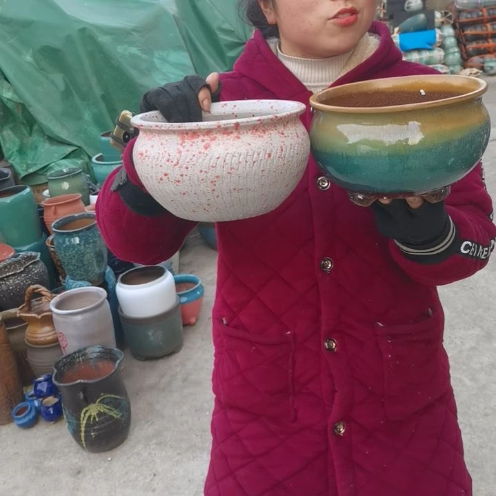 红陶瑕疵两个盆子。。。