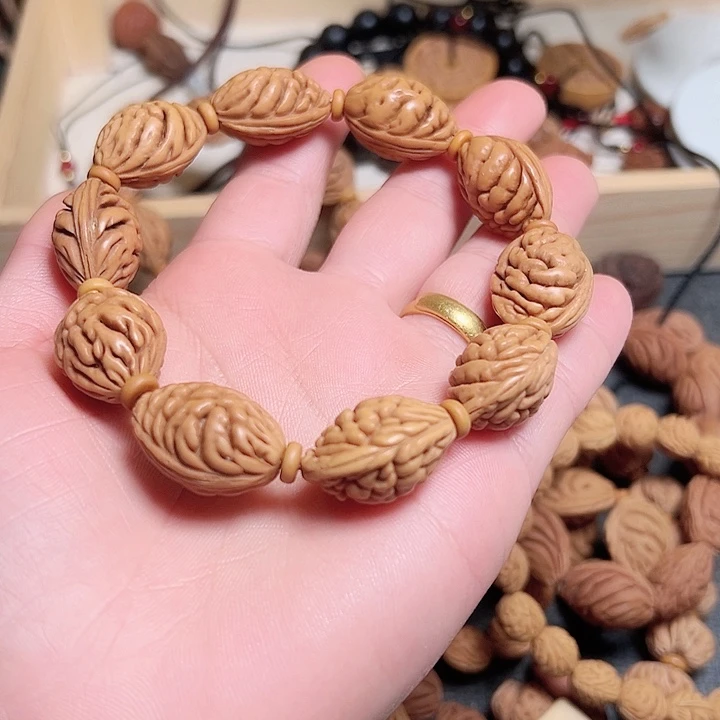 渔***翁桃核吊坠正宗桃核手串
