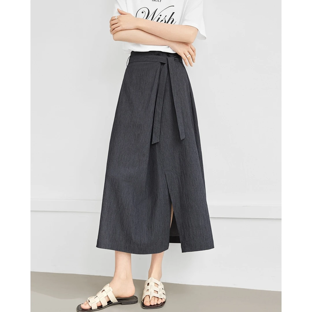 设计感开叉a字半身裙女2025夏新款肌理小众通勤休闲中长伞裙