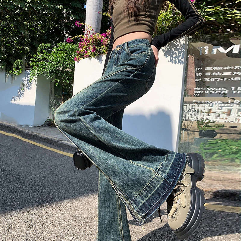 艾格街头百搭时尚休闲开叉马蹄裤宽松微喇美式蓝色牛仔裤女2025韩