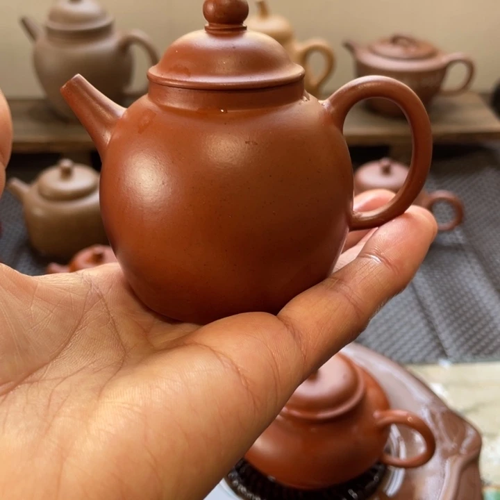 紫砂茶壶西**?朱泥巨轮有瑕