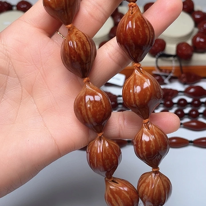 橄榄核手串当**服玉化素核