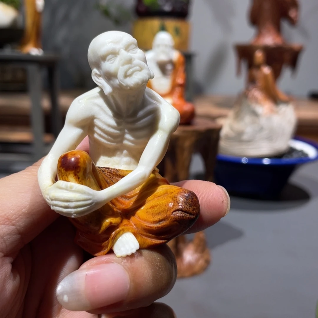 阿***金木鹿角雕刻罗汉摆件工艺品