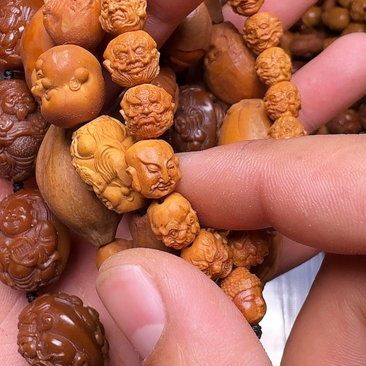 橄榄核手串你是谁