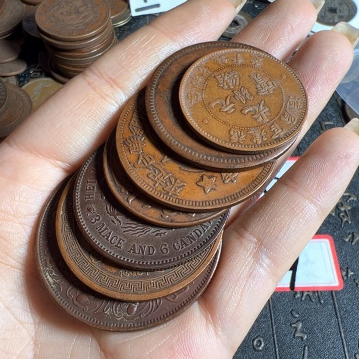 用***5七个铜币工艺品摆件