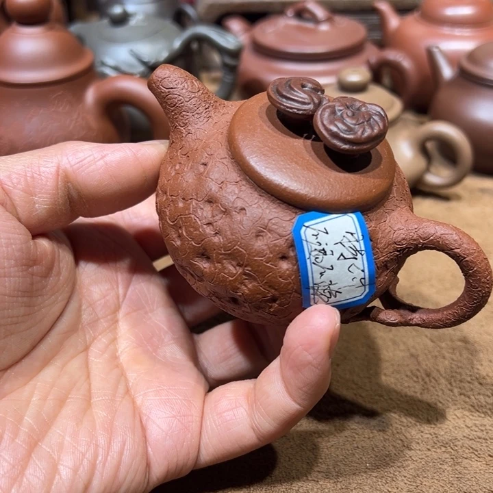 紫砂茶壶降***?宜兴紫砂