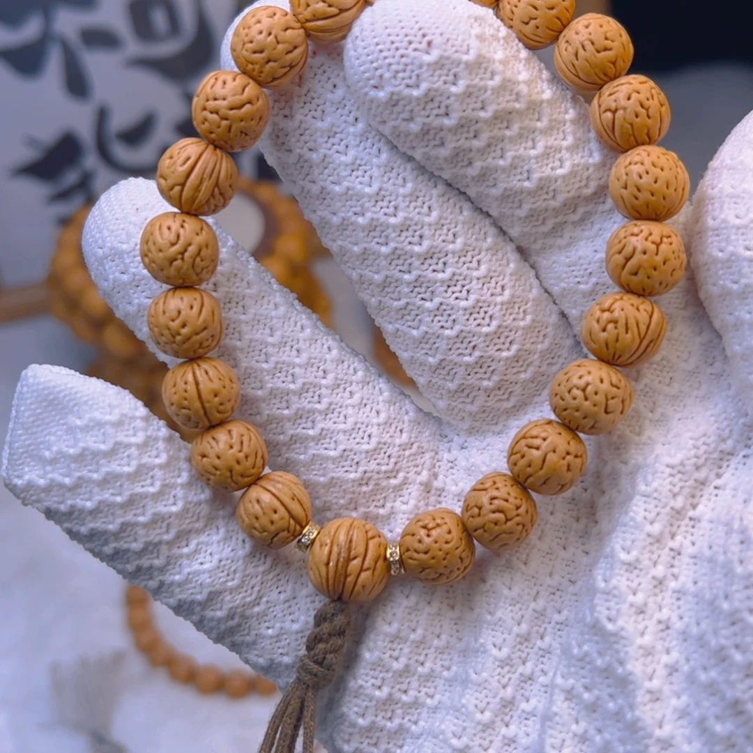 桃核手串1.1加「水晶肘子」野生桃核手持