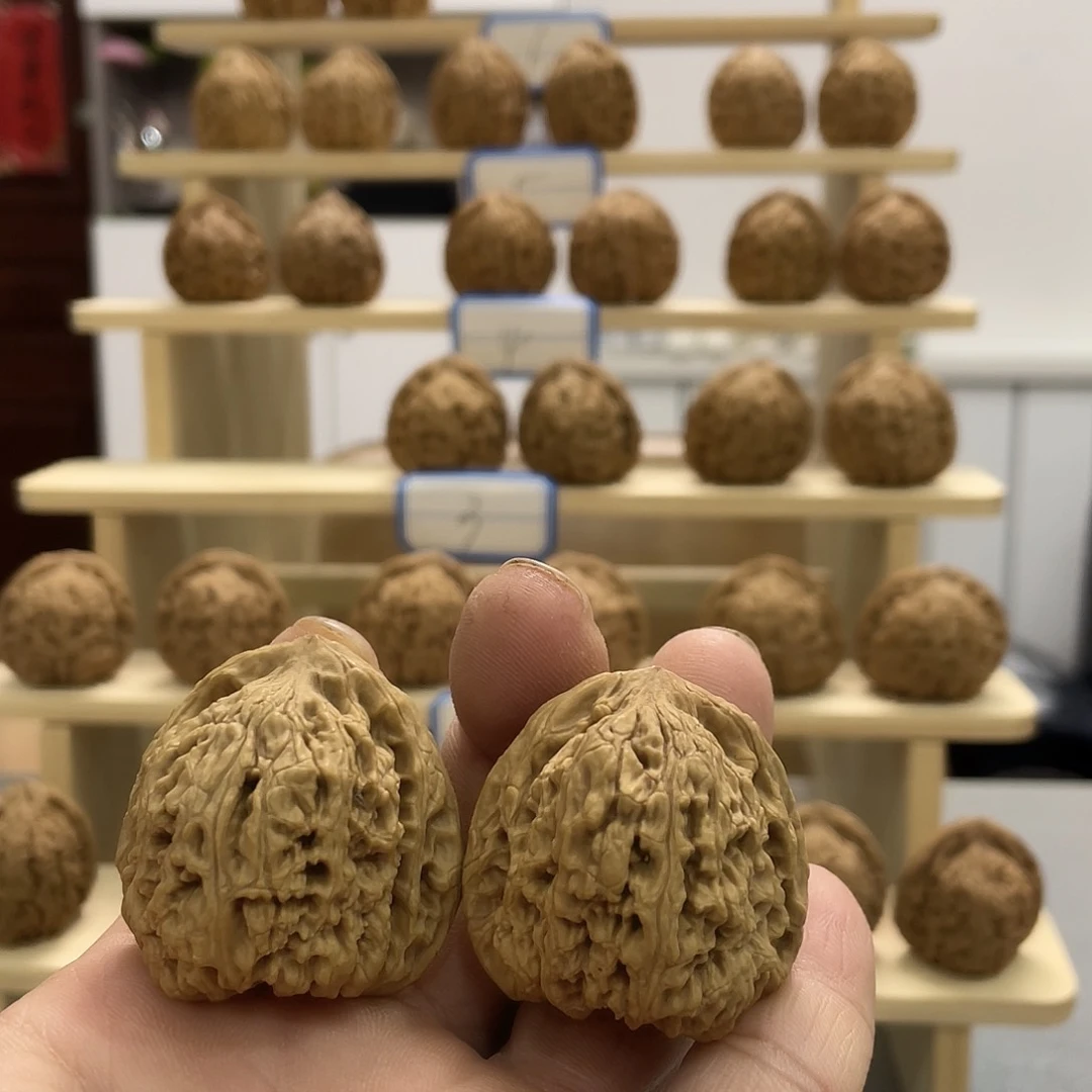 桃核吊坠小**天文玩核桃南将石