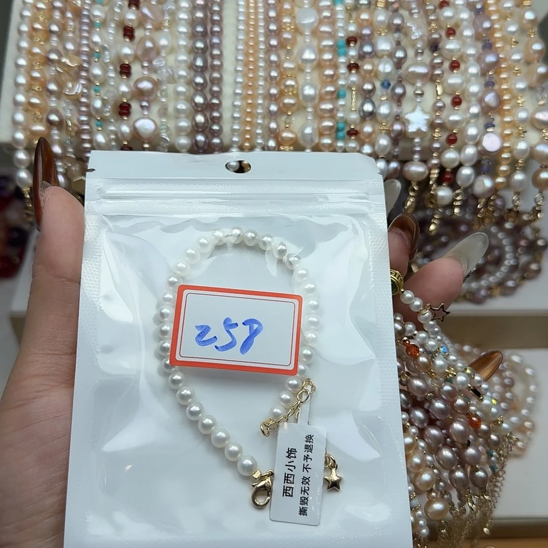 m***糖淡水珍珠钛钢手绳