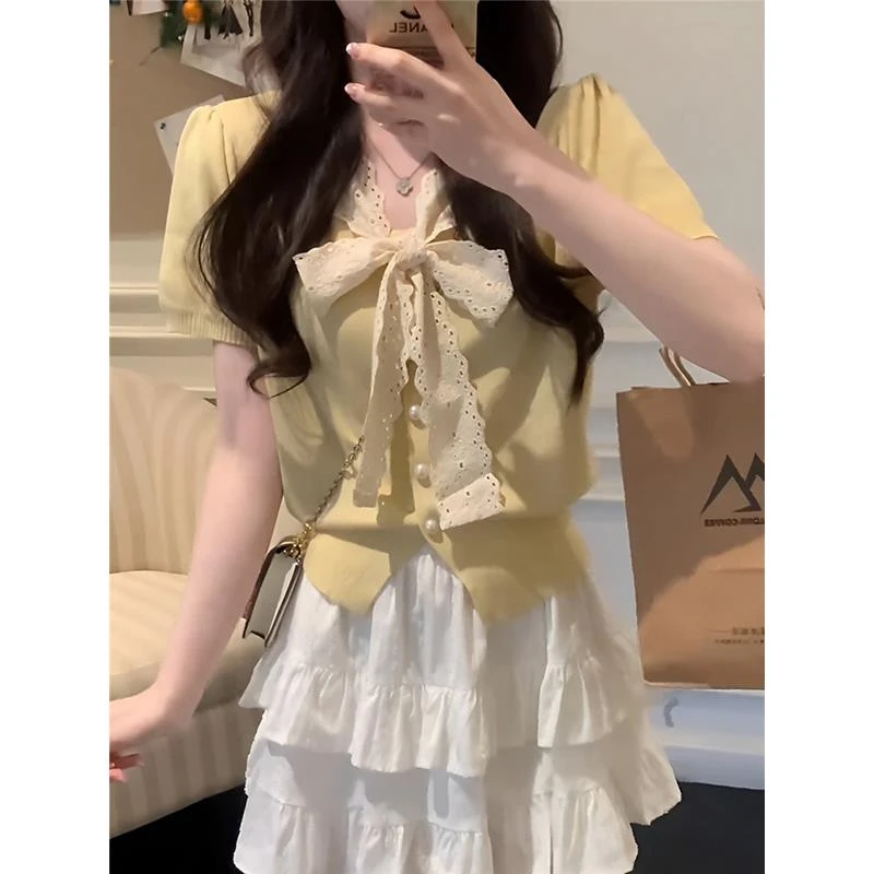 勿动1mojitos法式高级感蝴蝶结浅黄色泡泡袖上衣女2025年夏季新款