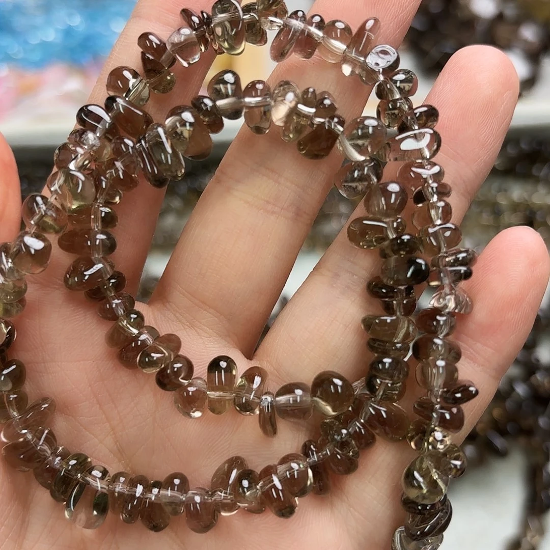 木****玛瑙/玉髓未镶嵌珠宝半成品茶晶中孔碎石一条