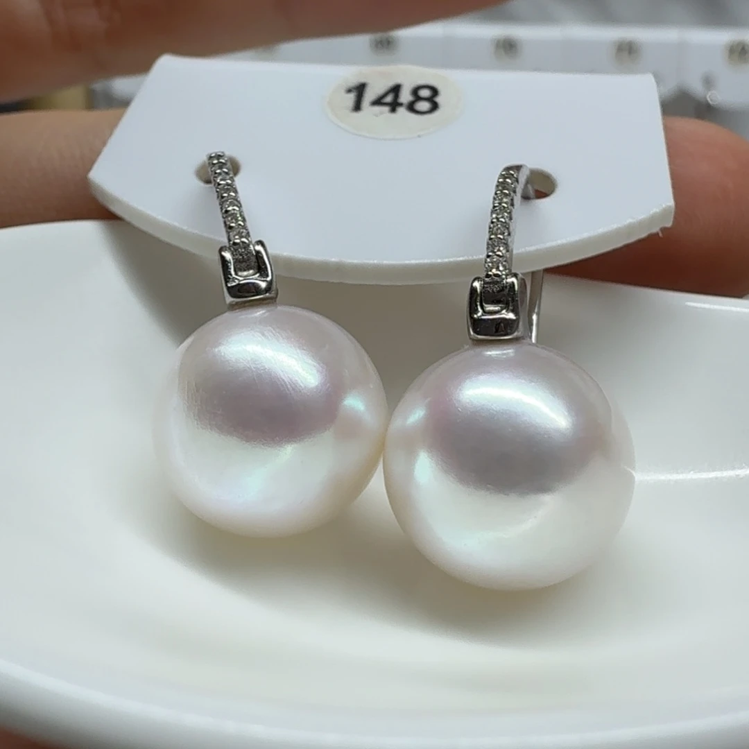 柠****淡水珍珠银S925镶嵌耳饰珍珠