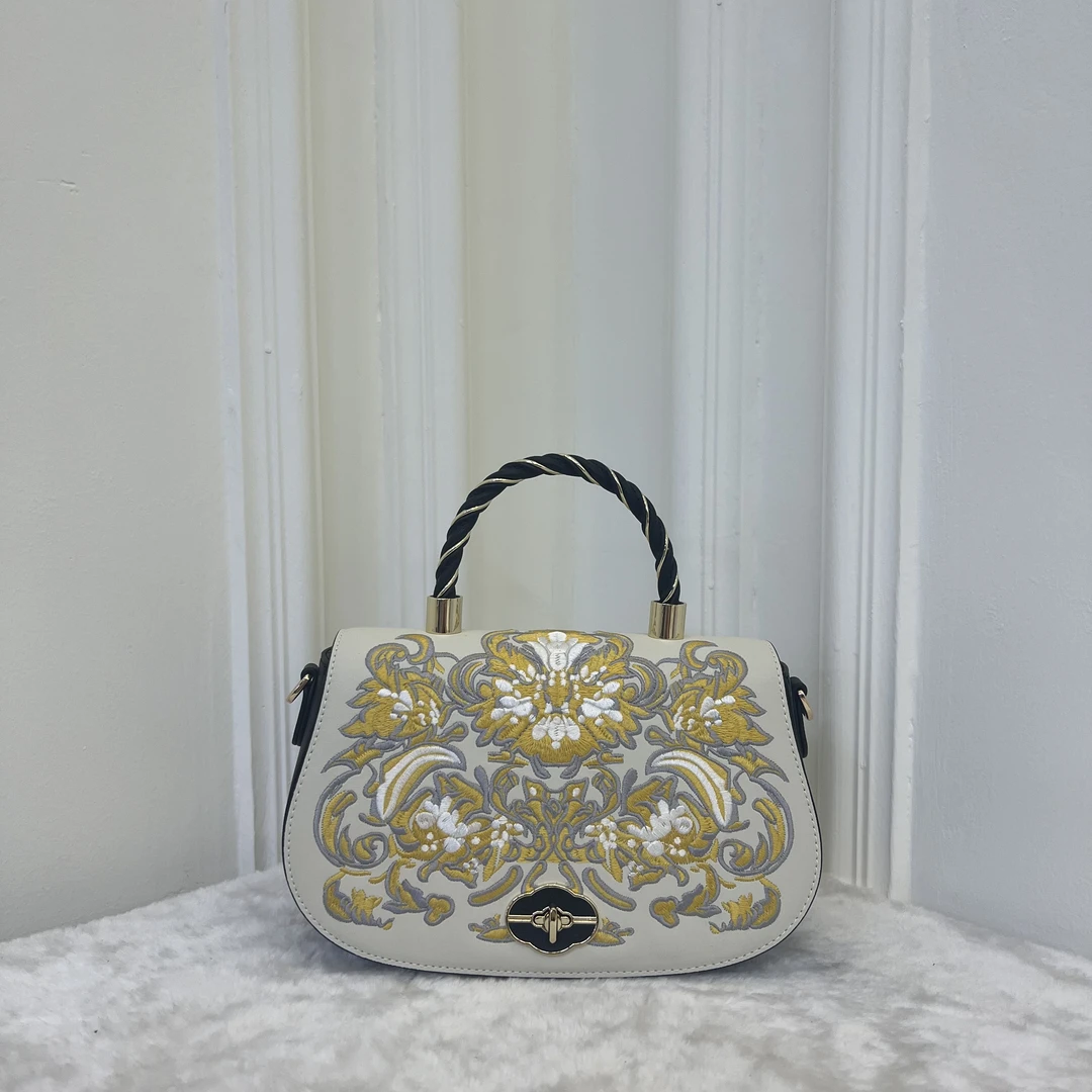 时尚轻奢57R79黄配黑经典手提斜挎女包