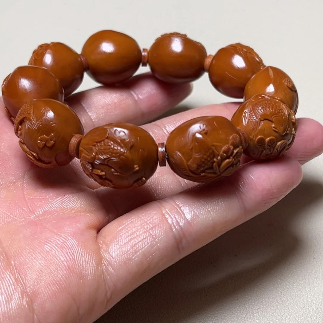 手串橄榄核1.8荷花鱼