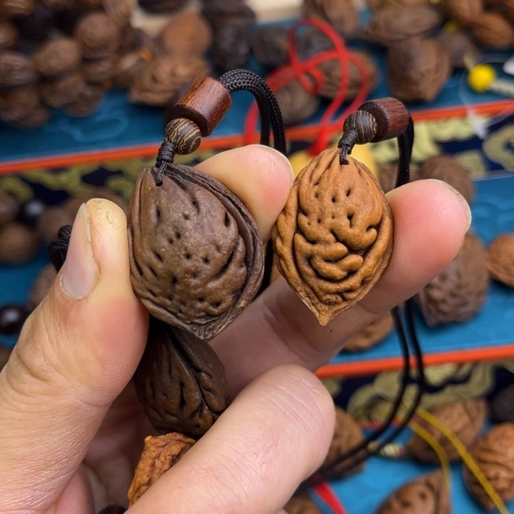 铭***心木质非金属桃枭吊坠桃枭吊坠