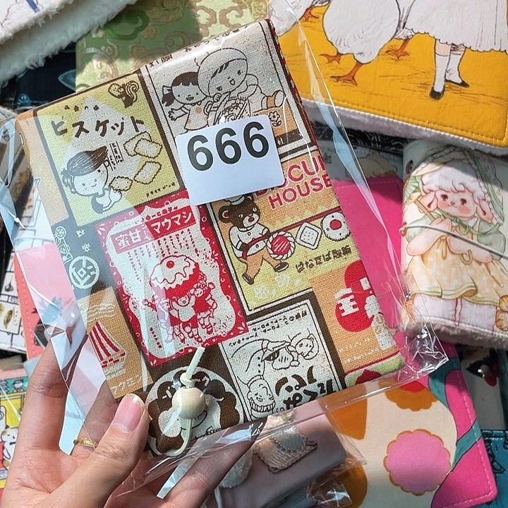 织绣小****子A6书衣带横线本666。