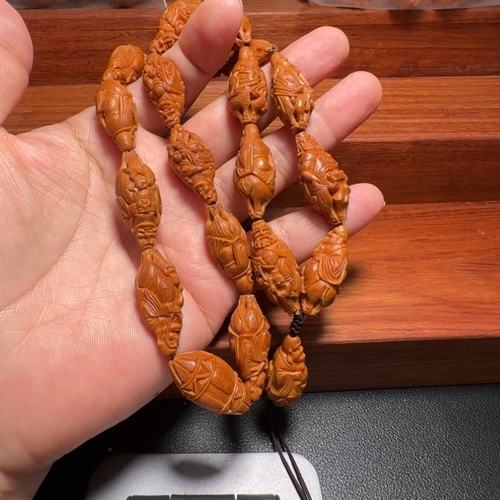秦***画吊坠橄榄核骑兽童子罗汉