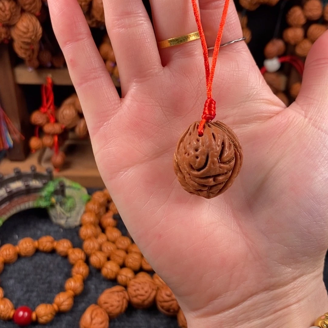 吊坠桃核桃枭手串