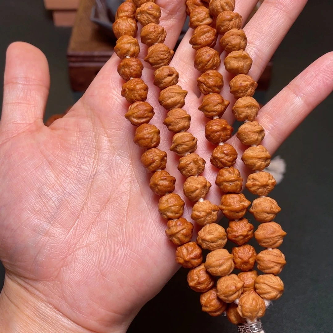 柏香籽/百香籽吊坠白牙横打手持