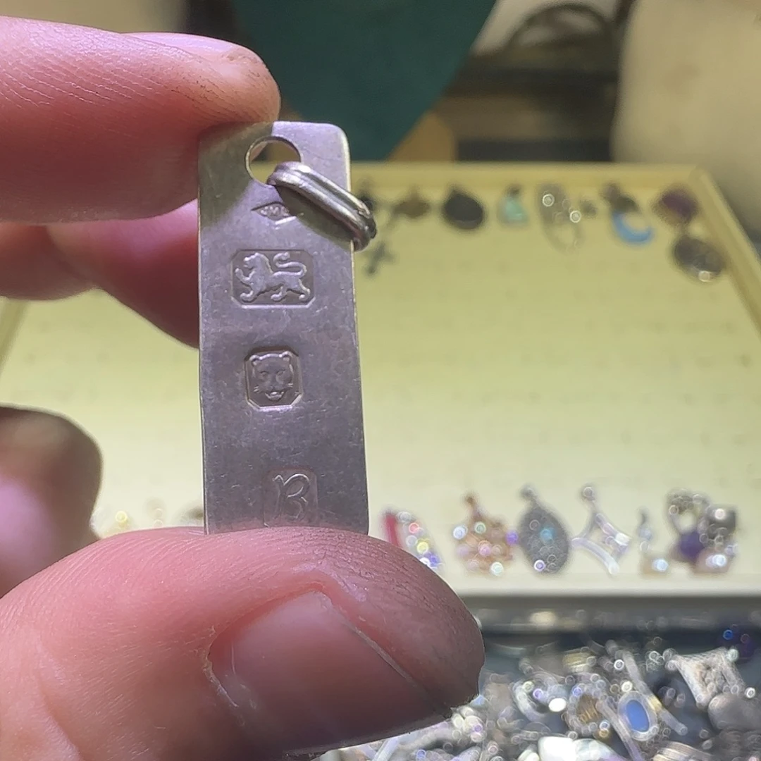 平***康大理石纯铜吊坠的设计也是