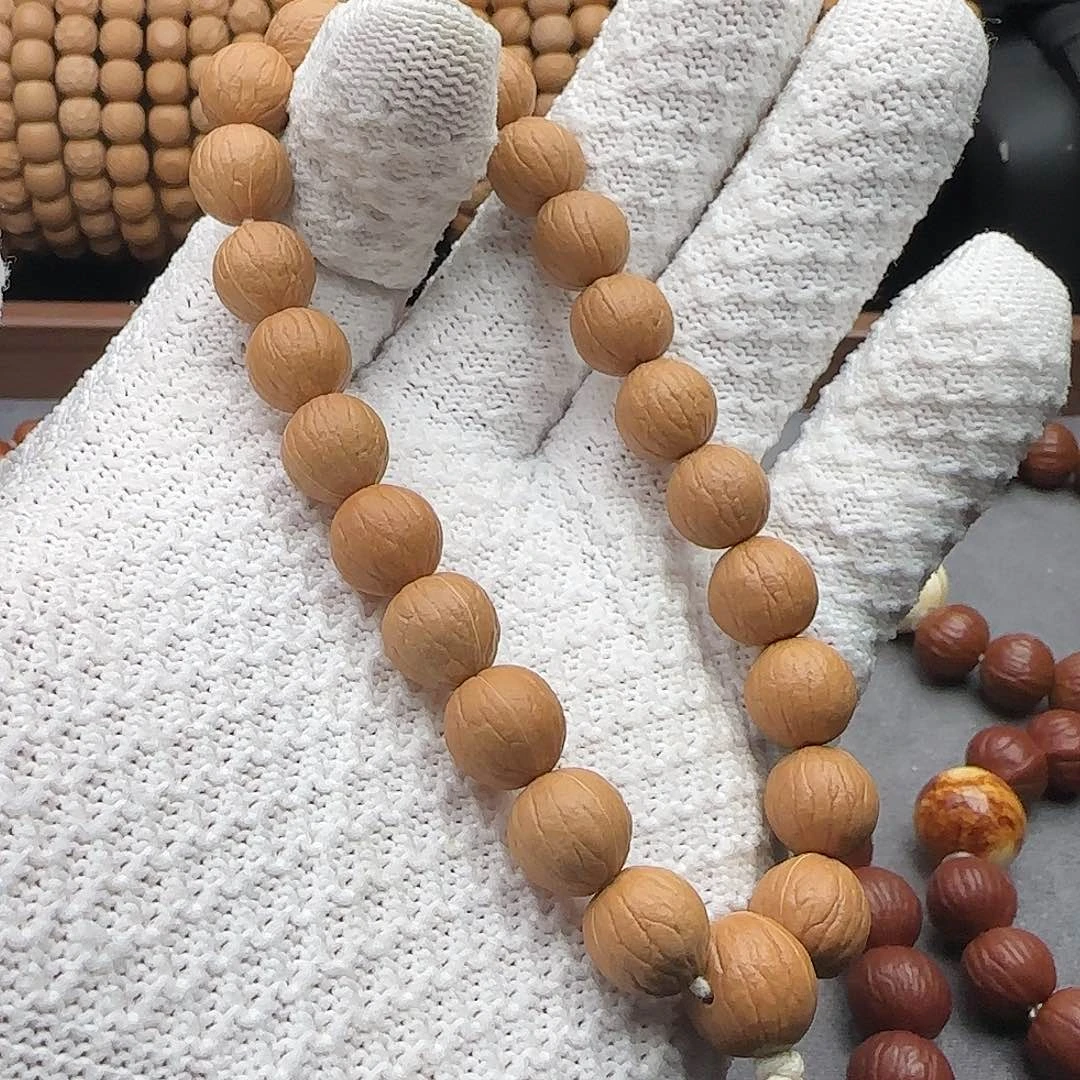 猴头核桃吊坠枫****?凤仙911