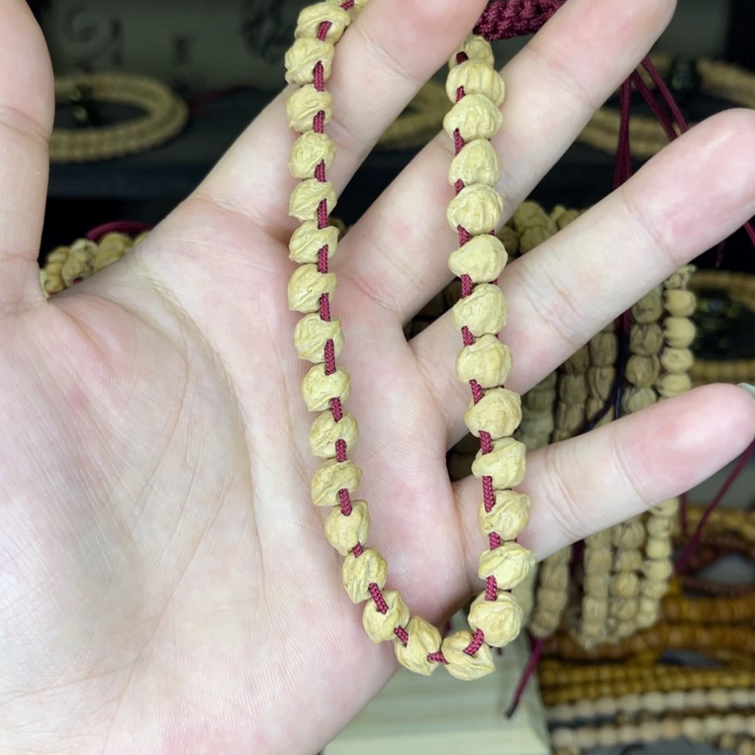 佳***佳柏香籽/百香籽吊坠