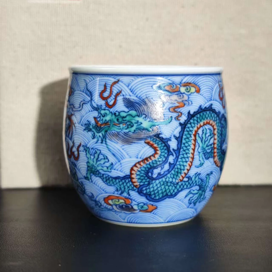 T49涂杏花海水龙纹杯