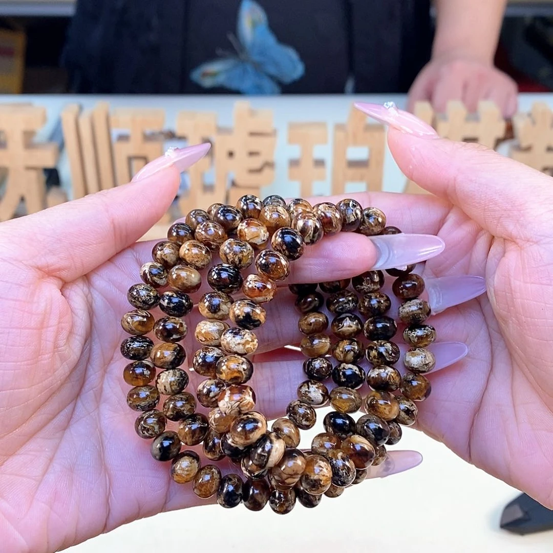 阜***吉未镶嵌琥珀裸石8m花珀