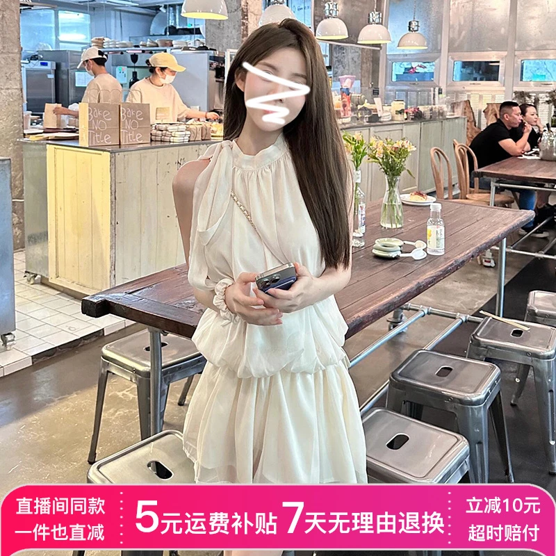 2025夏季新款法式气质杏色无袖挂脖连衣裙子女小个子海边度假短裙