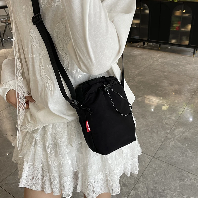 斜挎包个性水杯包多功能小巧便携手机包女式百搭休闲帆布包防水T