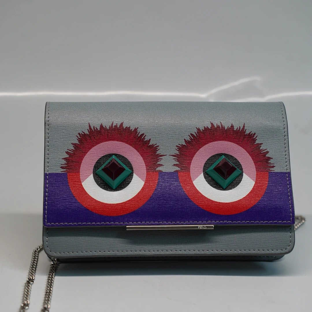 95新 FENDI/芬迪 小怪兽woc链条包/E00114