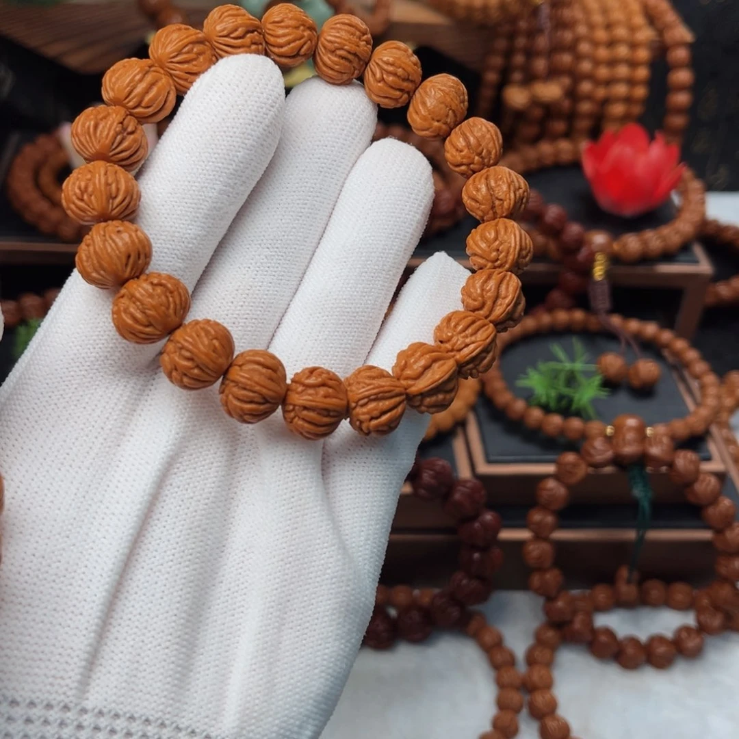 吊坠桃核江****14火麒麟手串