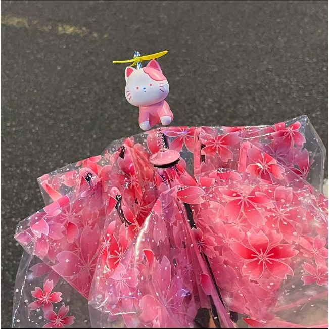 樱花小猫立体伞帽透明伞三折叠手动自动pvc雨伞竹蜻蜓弹簧小猫伞