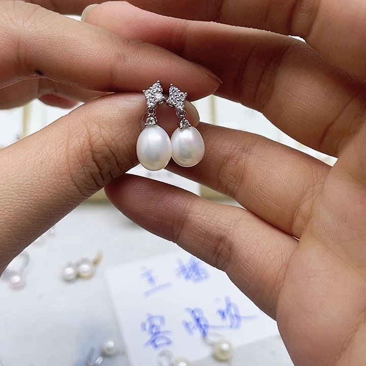 淡水珍珠耳饰银S925镶嵌栗****?