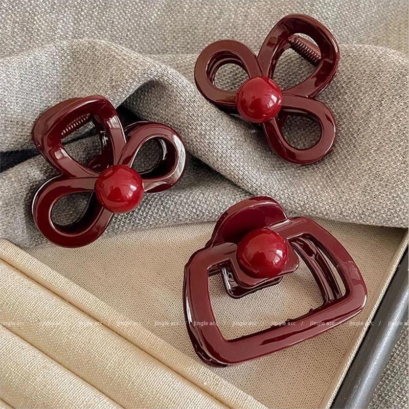安可拉红中号蝴蝶结抓夹女2025新款盘发夹发卡头饰高级感鲨鱼夹子