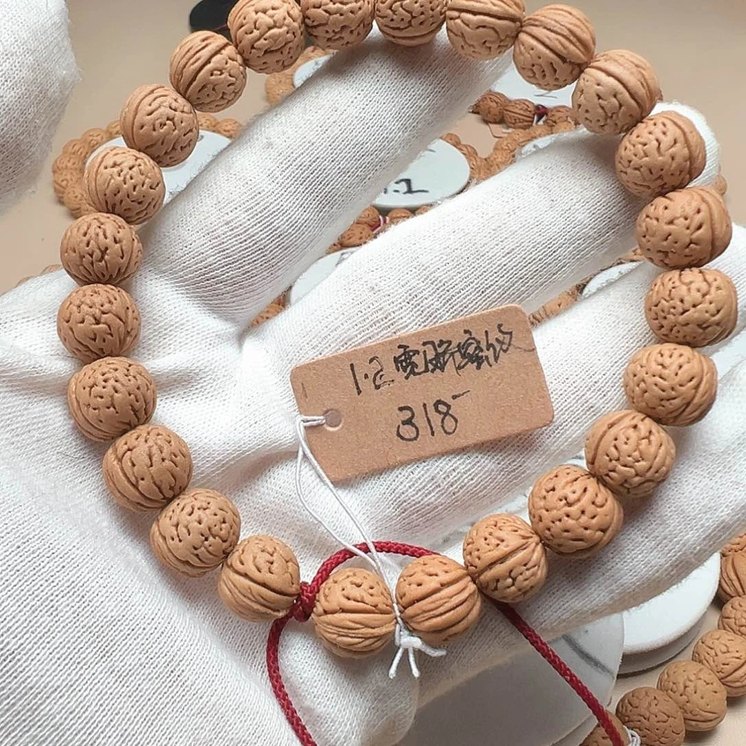咖***糖桃核手串1.2宽脐密纹