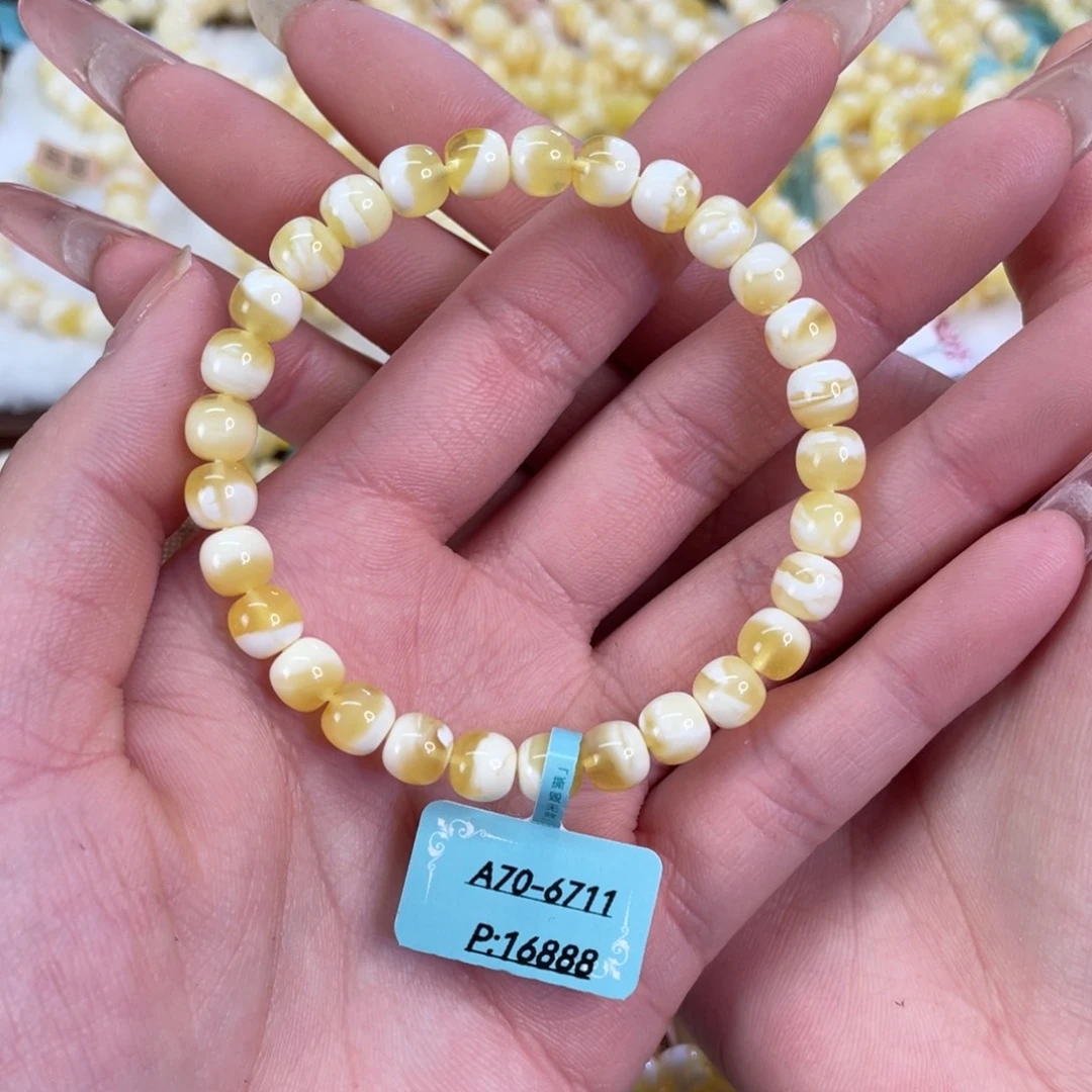 蜜蜡未镶嵌手串7mm 瓷漆白溶洞拉丝妖花