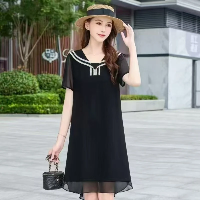 K气质时尚夏季新款娃娃领洋气遮肚连衣裙