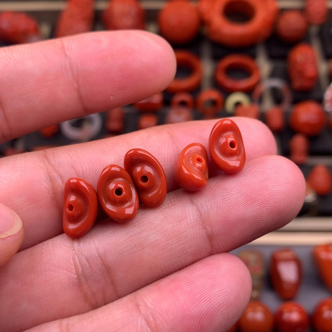 稔***翁南红玛瑙未镶嵌元宝11+