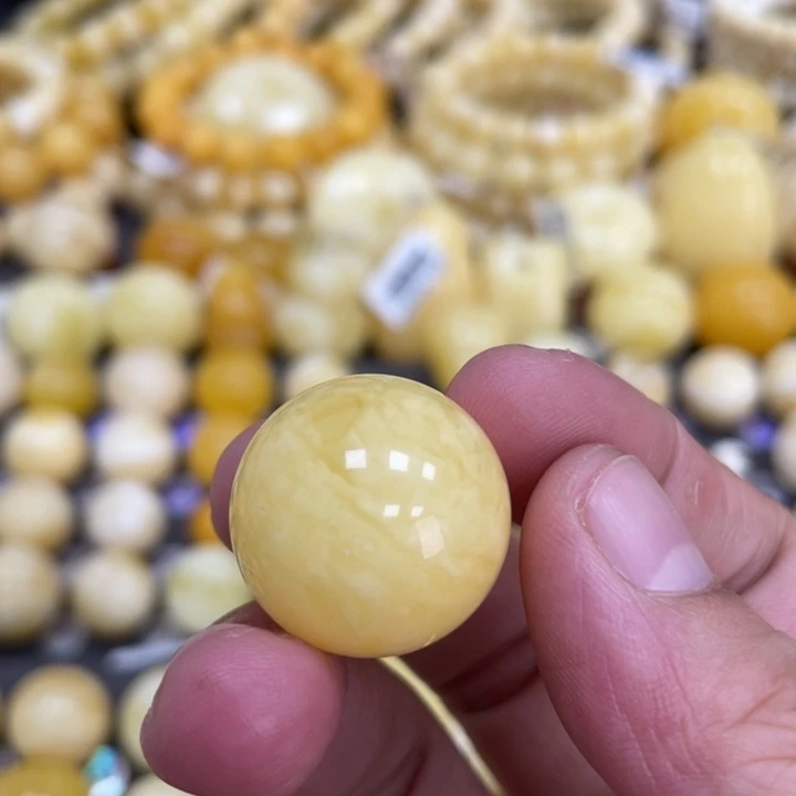 蜜蜡未镶嵌裸石21mm瑕疵妖花