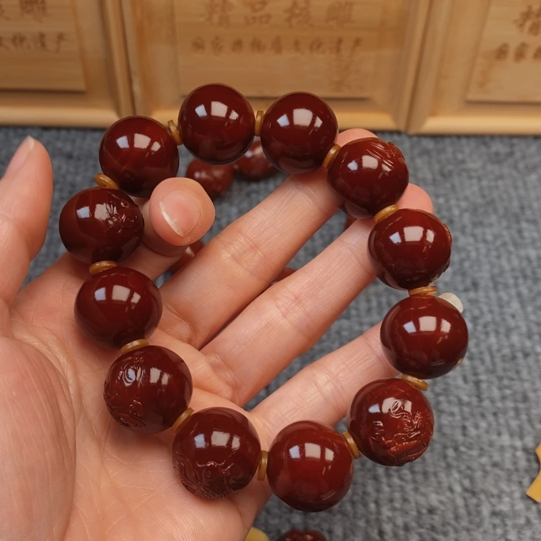 秦***皮橄榄核手串/手链鱼龙戏珠