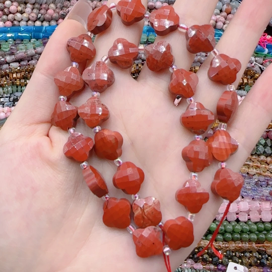 玛瑙/玉髓未镶嵌珠宝半成品天然红石切面四叶草一条