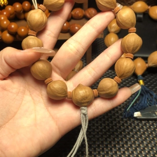 蹦***g橄榄核手串/手链素串