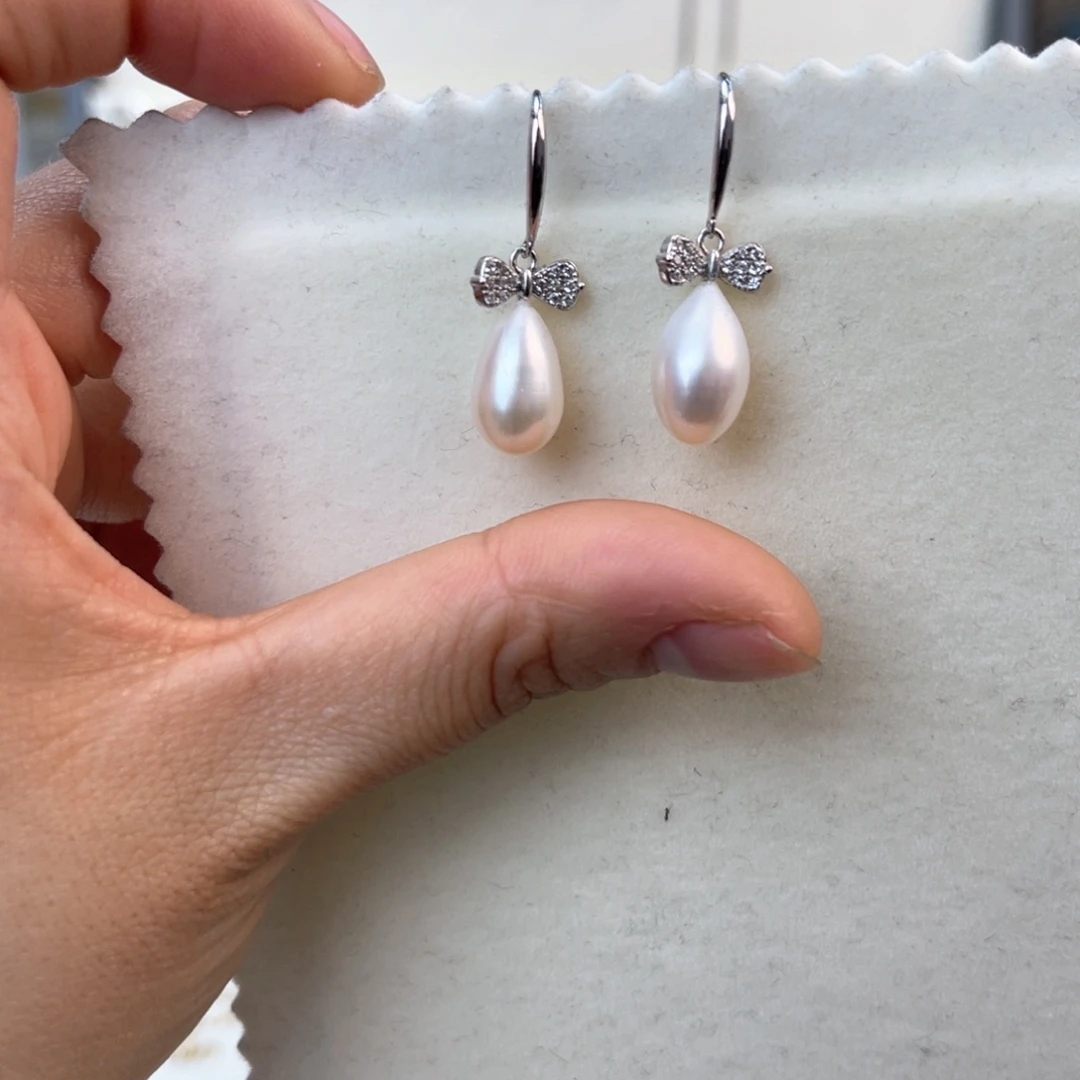 淡水珍珠耳饰银S925镶嵌不*春