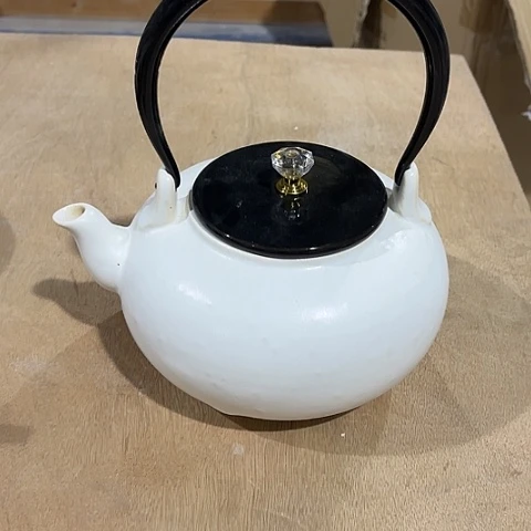 微瑕，明火，不能干烧，约900毫升大针孔，大气泡